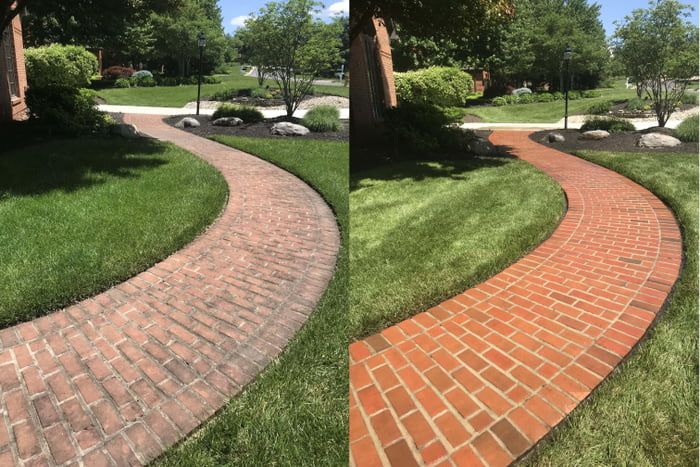 Brick walkway pressure washing before and after — faded bricks restored to vibrant red